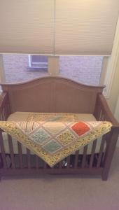 Crib with quilts